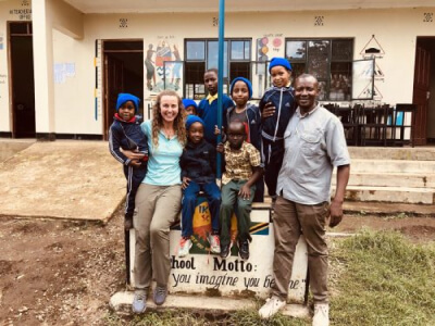 Michelle templeton at Ikirwa school with students — Michelle Templeton Wild Ride to Health
